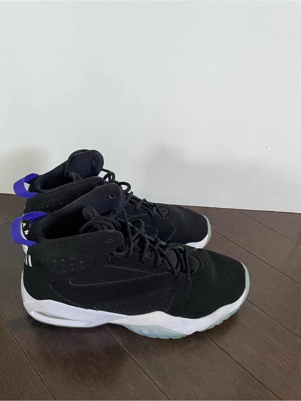 Jordan Men's Black High-Top Sneakers with Purple Heel Tabs